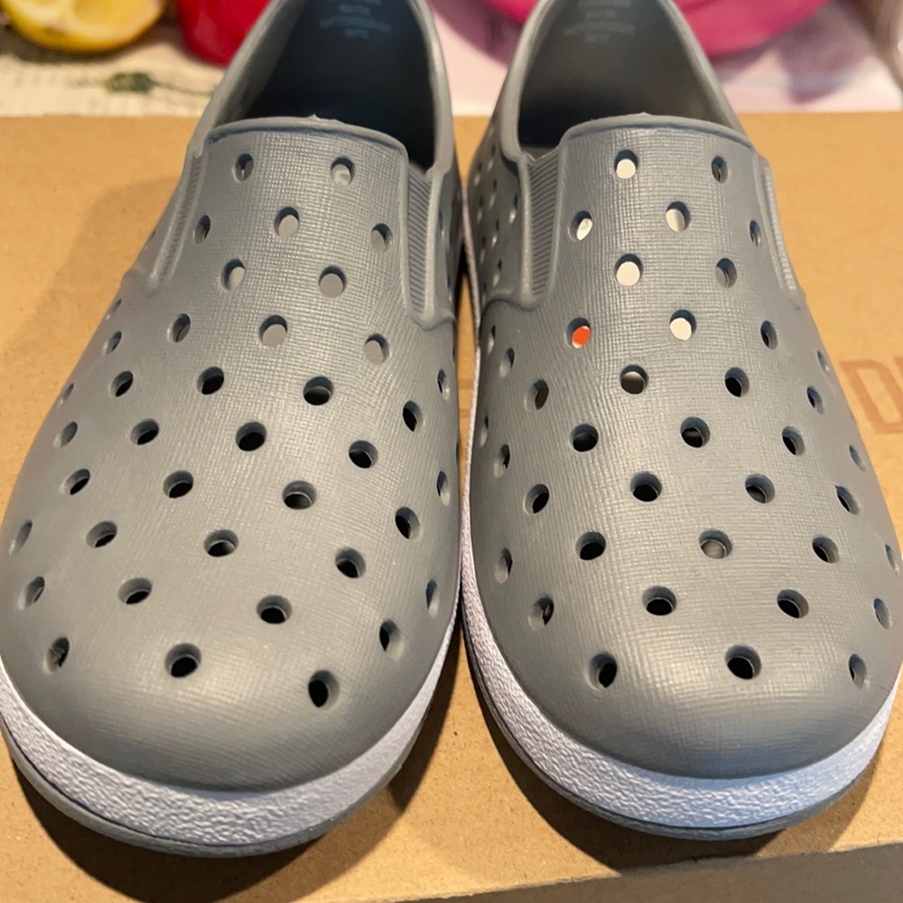 Brand new  water shoes size 10 for boys or girls.